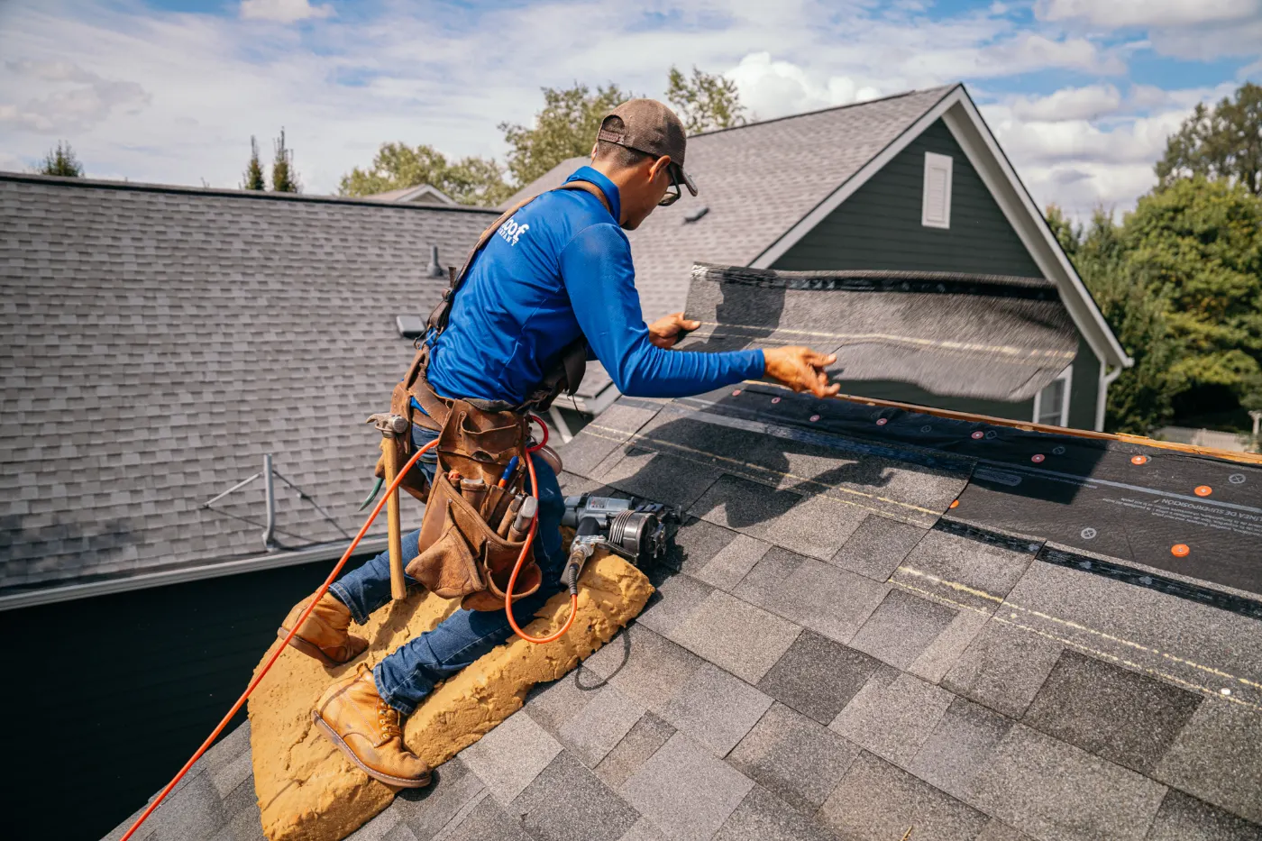 Tarping and dry-in on a Glenwood commercial roof
